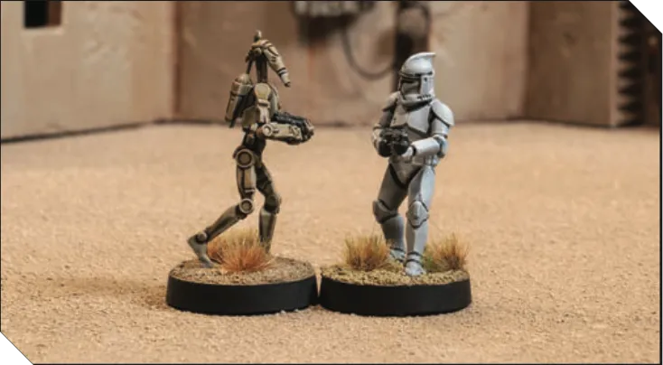 One Clone trooper and one Droid trooper with bases physically touhcing.